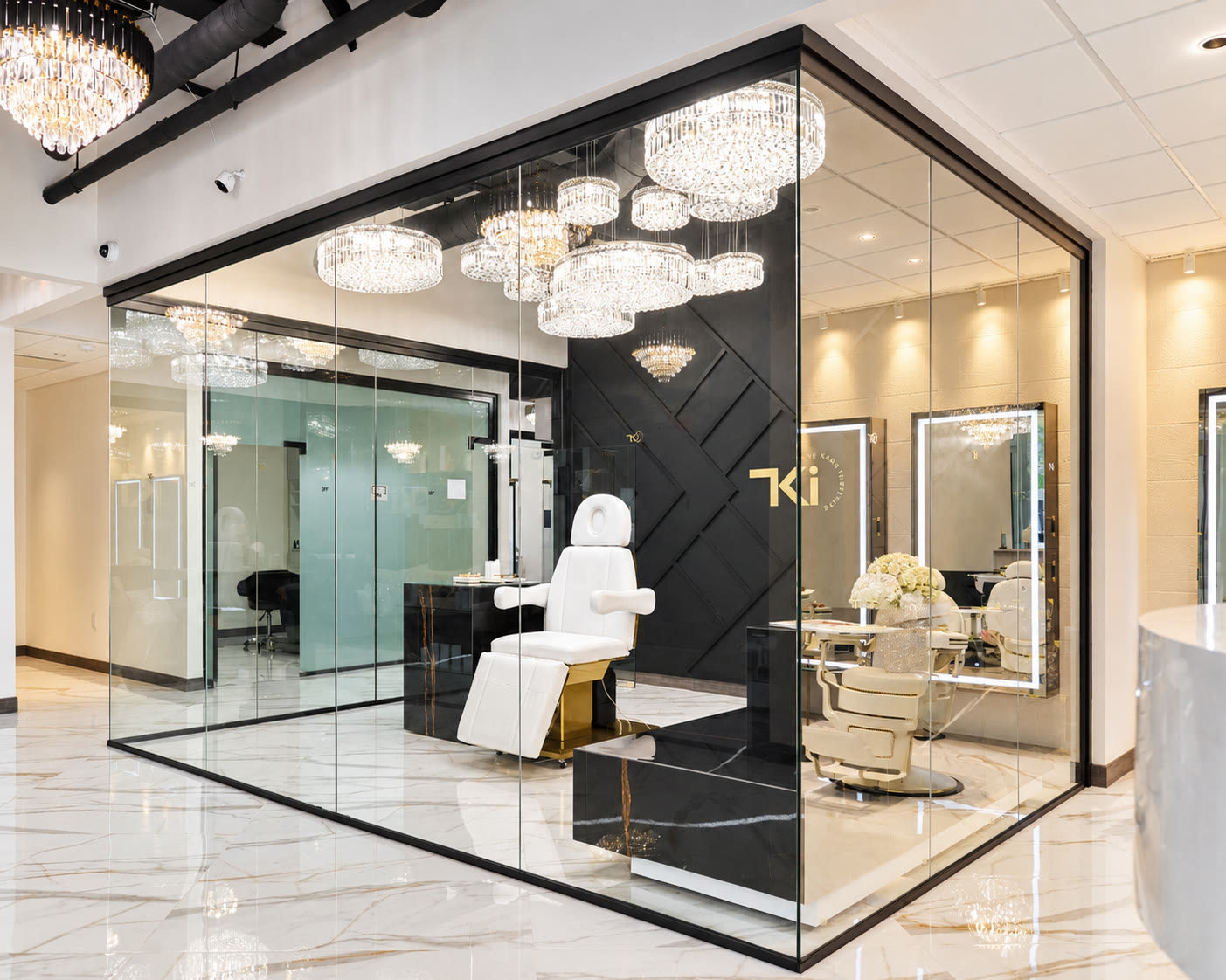The Observatory: a glass-walled treatment suite under crystal chandeliers