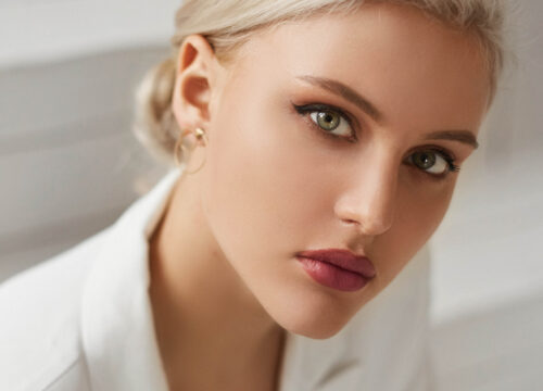 Photo of a beautiful blonde woman with green eyes
