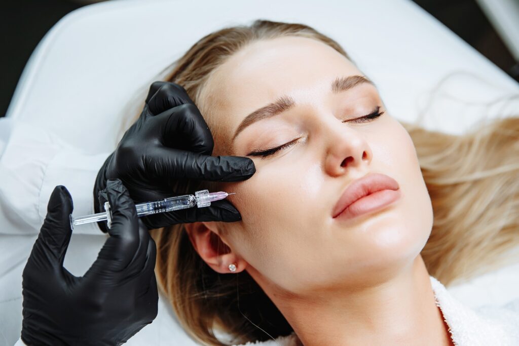 Photo of a woman getting filler dissolver treatments